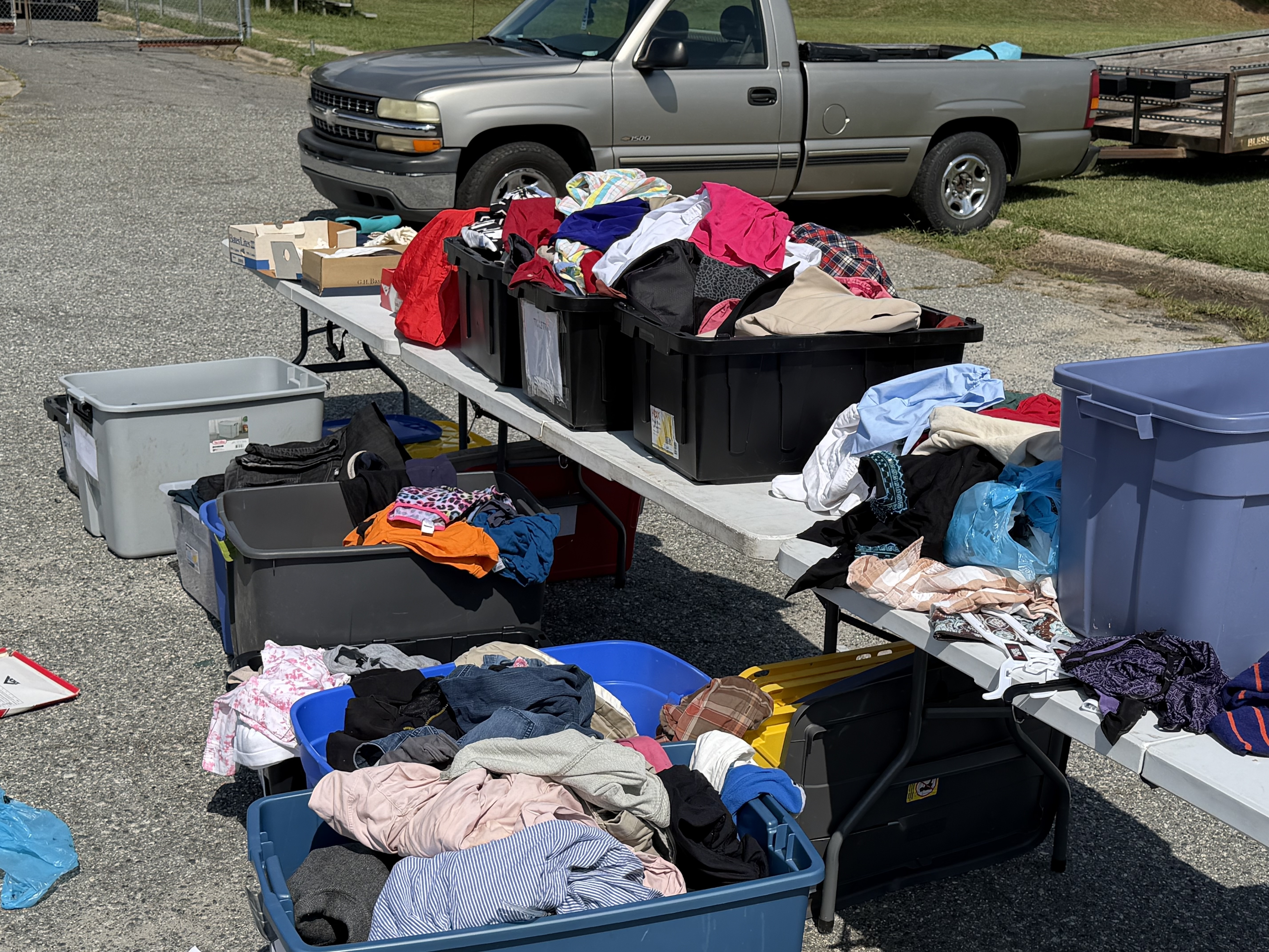 Donated clothing arranged for neighbors to choose from